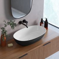 Lavaberg Skinn umywalka 60x36 cm owalna nablatowa biała/czarna połysk 663130061094