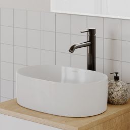 Oltens Lom Thin umywalka 52x30 cm owalna nablatowa z powłoką SmartClean biała 40828000