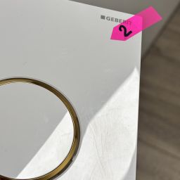 Outlet - Geberit Sigma przycisk spłukujący do WC biały-złoty 115.882.KK.1