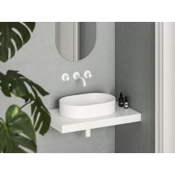 Ravak Ceramic umywalka 55x37 cm owalna nablatowa biała XJX0E155000